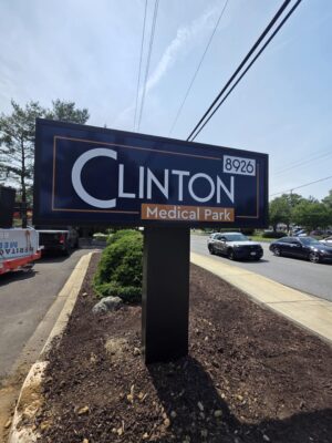 Photo of large entrance monument sign for Clinton Medical Park in Clinton, Maryland. Sign was manufactured & installed by Distinct Sign Solutions in Fredericksburg, VA