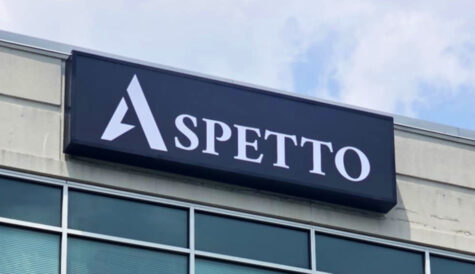 Photo of black & white sign cabinet affixed to tall building in Stafford, VA. Sign was manufactured & installed by Distinct Sign Solutions in Fredericksburg, VA