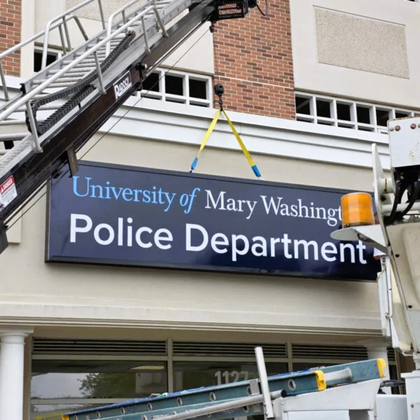 Sign cabinet installed by Distinct Sign Solutions for University of Mary Washington Police Department in Fredericksburg, VA. Public service signage for improved visibility.
