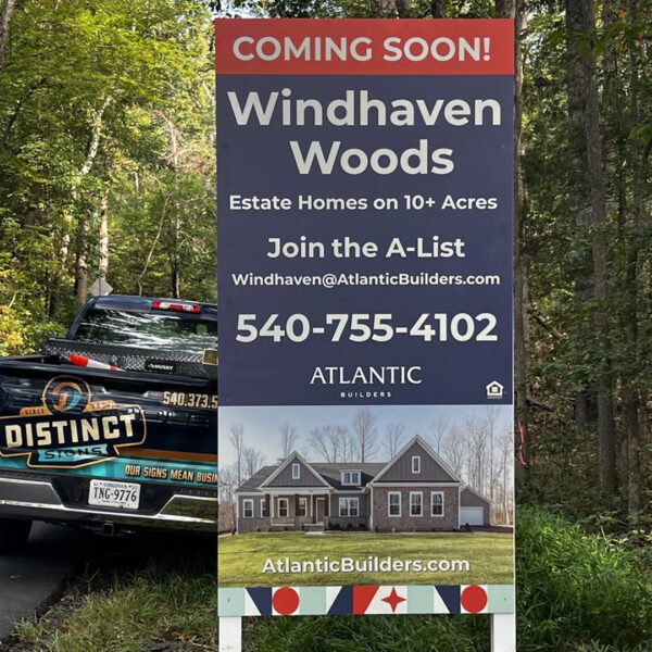 Atlantic Builders coming soon sign for Windhaven Woods, advertising estate homes on 10+ acres.