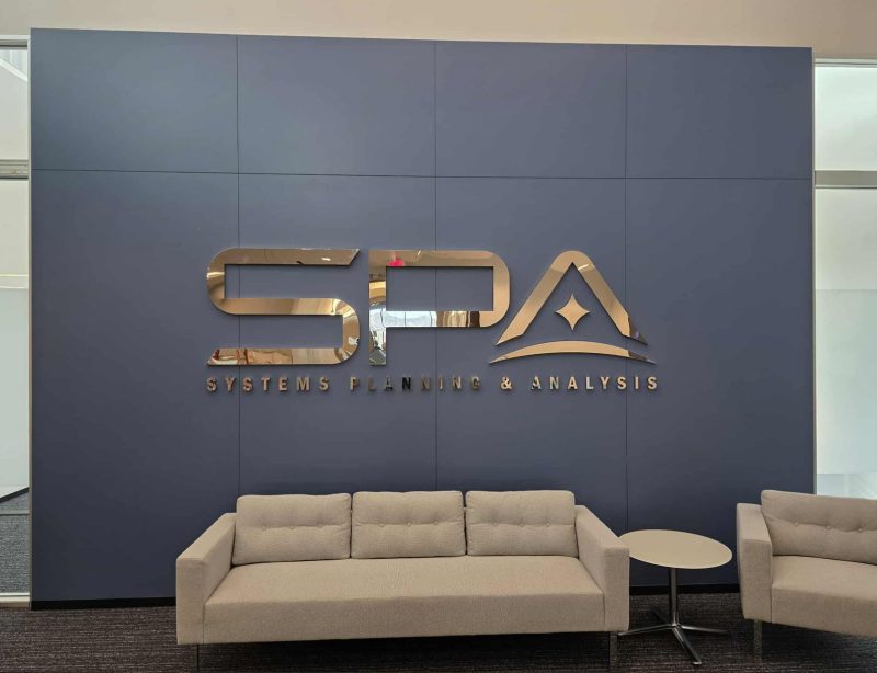 Systems Planning & Analysis partnered with Distinct Sign Solutions for Custom office signage in Washington DC.