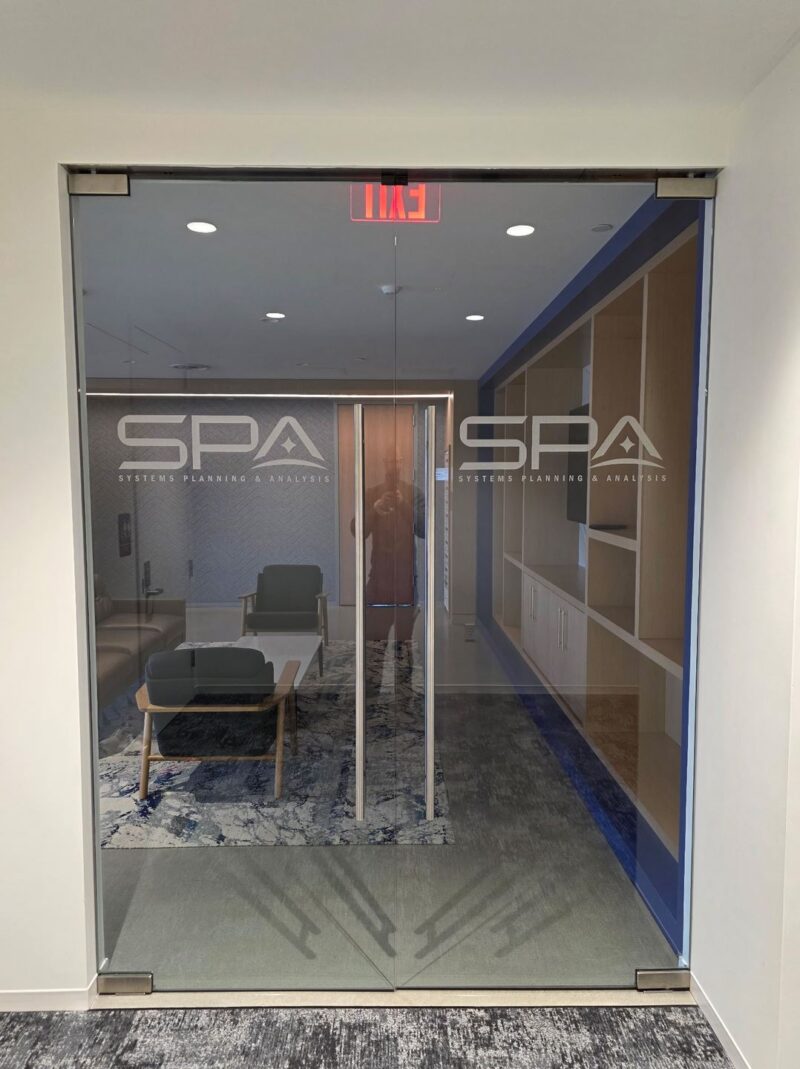 Systems Planning & Analysis partnered with Distinct Sign Solutions for Vinyl graphics in Alexandria.