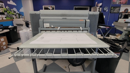 Large-format printer producing blueprint prints for construction professionals. 